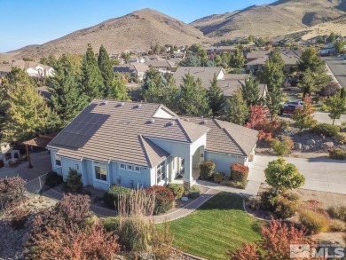 Gorgeously landscaped 1-story home in the desirable Grand Vistas on Hidden Valley Country Club in Nevada - for sale on GolfHomes.com, golf home, golf lot