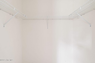 Now available is this wonderful one level ranch style home in on Sandpiper Bay Golf and Country Club in North Carolina - for sale on GolfHomes.com, golf home, golf lot