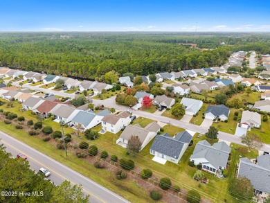 Now available is this wonderful one level ranch style home in on Sandpiper Bay Golf and Country Club in North Carolina - for sale on GolfHomes.com, golf home, golf lot