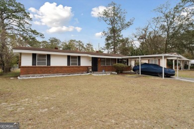 Welcome to this beautifully maintained MOVE-IN READY gem just on Bacon Park Golf Course in Georgia - for sale on GolfHomes.com, golf home, golf lot