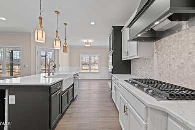 Luxury Golf Course Living on Hole #6 in Keith Hills! Loaded with on Keith Hills Country Club  in North Carolina - for sale on GolfHomes.com, golf home, golf lot