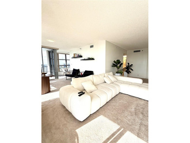 Experience refined luxury and stunning panoramic views in this on Turnberry Isle Resort and Club in Florida - for sale on GolfHomes.com, golf home, golf lot