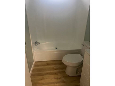 Don't miss your chance to own this beautifully renovated home in on Hamptons Golf Club in Florida - for sale on GolfHomes.com, golf home, golf lot