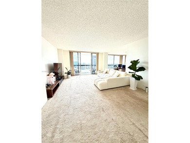 Experience refined luxury and stunning panoramic views in this on Turnberry Isle Resort and Club in Florida - for sale on GolfHomes.com, golf home, golf lot