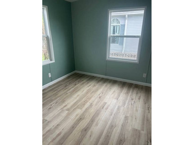 Don't miss your chance to own this beautifully renovated home in on Hamptons Golf Club in Florida - for sale on GolfHomes.com, golf home, golf lot