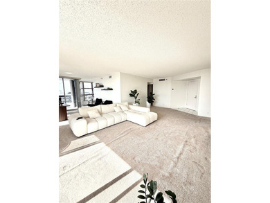 Experience refined luxury and stunning panoramic views in this on Turnberry Isle Resort and Club in Florida - for sale on GolfHomes.com, golf home, golf lot