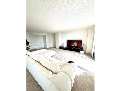 Experience refined luxury and stunning panoramic views in this on Turnberry Isle Resort and Club in Florida - for sale on GolfHomes.com, golf home, golf lot