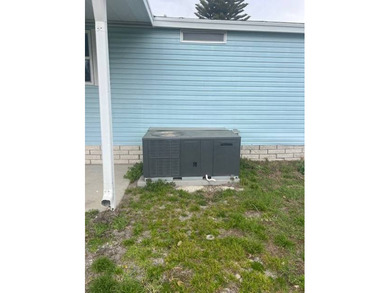 Don't miss your chance to own this beautifully renovated home in on Hamptons Golf Club in Florida - for sale on GolfHomes.com, golf home, golf lot