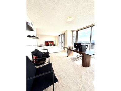 Experience refined luxury and stunning panoramic views in this on Turnberry Isle Resort and Club in Florida - for sale on GolfHomes.com, golf home, golf lot