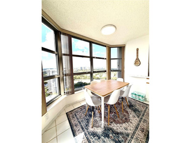 Experience refined luxury and stunning panoramic views in this on Turnberry Isle Resort and Club in Florida - for sale on GolfHomes.com, golf home, golf lot