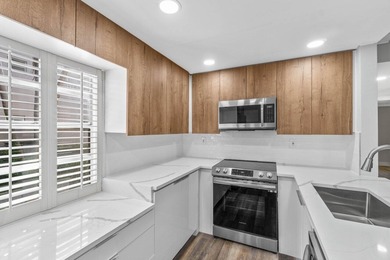 This recently renovated 2 bedroom, 2 bathroom first floor condo on Kings Point Golf -Flanders Way in Florida - for sale on GolfHomes.com, golf home, golf lot