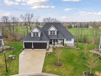 This stunning custom-built rambler at The Woods at Rush Creek on Rush Creek Golf Club in Minnesota - for sale on GolfHomes.com, golf home, golf lot