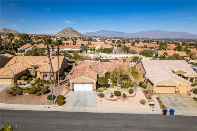 Nestled in a quiet cul-de-sac in Sun City Summerlin, this home on Highland Falls Golf Club in Nevada - for sale on GolfHomes.com, golf home, golf lot
