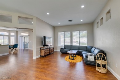 Nestled in a quiet cul-de-sac in Sun City Summerlin, this home on Highland Falls Golf Club in Nevada - for sale on GolfHomes.com, golf home, golf lot