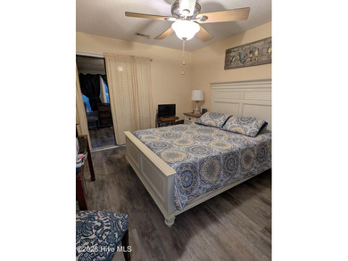 Lovely townhouse in River Bend, end unit on quiet street. Two on River Bend Golf and Country Club in North Carolina - for sale on GolfHomes.com, golf home, golf lot