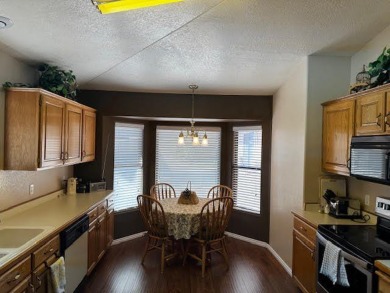 This Beautiful Townhome is nestled right on the Golf Course in on Southgate Golf Course in Utah - for sale on GolfHomes.com, golf home, golf lot