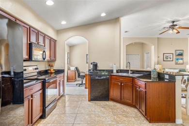 Under contract-accepting backup offers. WELL-MAINTAINED on Tampa Bay Golf and Country Club in Florida - for sale on GolfHomes.com, golf home, golf lot