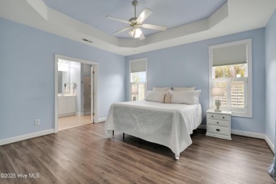 Beautiful all-brick home boasts an open layout that immediately on Magnolia Greens Golf Plantation in North Carolina - for sale on GolfHomes.com, golf home, golf lot