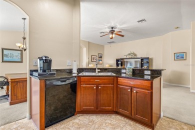 Under contract-accepting backup offers. WELL-MAINTAINED on Tampa Bay Golf and Country Club in Florida - for sale on GolfHomes.com, golf home, golf lot