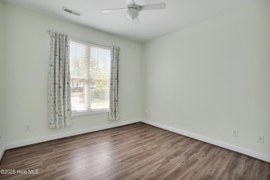 Beautiful all-brick home boasts an open layout that immediately on Magnolia Greens Golf Plantation in North Carolina - for sale on GolfHomes.com, golf home, golf lot