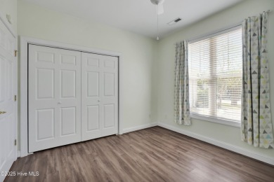 Beautiful all-brick home boasts an open layout that immediately on Magnolia Greens Golf Plantation in North Carolina - for sale on GolfHomes.com, golf home, golf lot