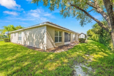 Under contract-accepting backup offers. WELL-MAINTAINED on Tampa Bay Golf and Country Club in Florida - for sale on GolfHomes.com, golf home, golf lot