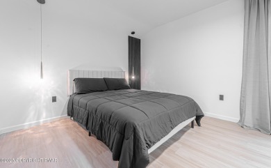 ULTRA MODERN MINIMALISTIC CAPE COD Completely Renovated w/ Clean on Pocono Farms Country Club in Pennsylvania - for sale on GolfHomes.com, golf home, golf lot