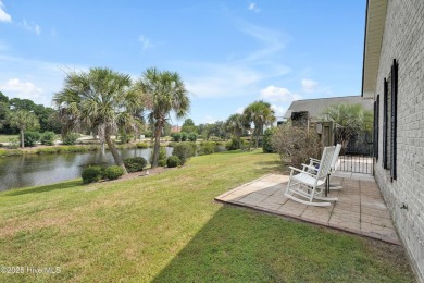 Beautiful all-brick home boasts an open layout that immediately on Magnolia Greens Golf Plantation in North Carolina - for sale on GolfHomes.com, golf home, golf lot
