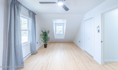 ULTRA MODERN MINIMALISTIC CAPE COD Completely Renovated w/ Clean on Pocono Farms Country Club in Pennsylvania - for sale on GolfHomes.com, golf home, golf lot