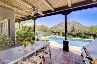 A true Troon oasis! This beautiful custom home was perfectly on Troon Country Club in Arizona - for sale on GolfHomes.com, golf home, golf lot