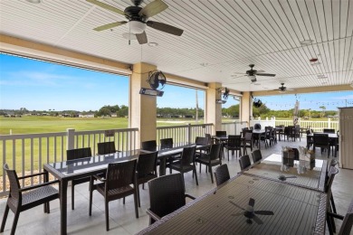 Under contract-accepting backup offers. WELL-MAINTAINED on Tampa Bay Golf and Country Club in Florida - for sale on GolfHomes.com, golf home, golf lot