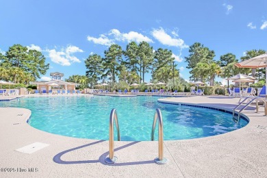 Beautiful all-brick home boasts an open layout that immediately on Magnolia Greens Golf Plantation in North Carolina - for sale on GolfHomes.com, golf home, golf lot