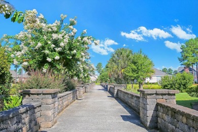 Beautiful all-brick home boasts an open layout that immediately on Magnolia Greens Golf Plantation in North Carolina - for sale on GolfHomes.com, golf home, golf lot