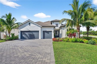 This nearly new luxury residence in the prestigious Marsh Cove on The Golf Club At Fiddlers Creek in Florida - for sale on GolfHomes.com, golf home, golf lot