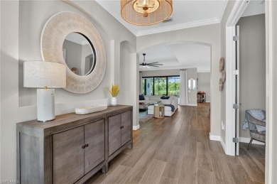 This nearly new luxury residence in the prestigious Marsh Cove on The Golf Club At Fiddlers Creek in Florida - for sale on GolfHomes.com, golf home, golf lot