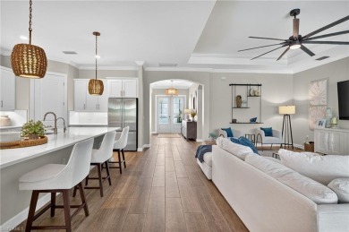 This nearly new luxury residence in the prestigious Marsh Cove on The Golf Club At Fiddlers Creek in Florida - for sale on GolfHomes.com, golf home, golf lot