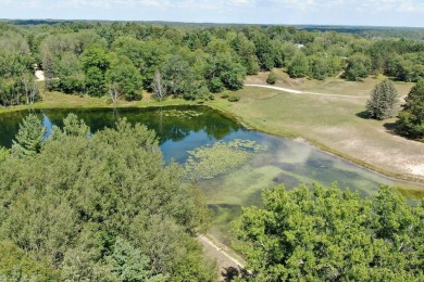 Move-in ready 3-bedroom, 2-bath ranch in the peaceful hills of on Canadian Lakes Country Club-The Highlands Course in Michigan - for sale on GolfHomes.com, golf home, golf lot