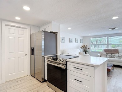 Live the Florida lifestyle in the highly sought-after waterfront on Gulf Harbors Golf Course in Florida - for sale on GolfHomes.com, golf home, golf lot