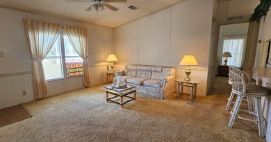 FURNISHED TURN KEY, OPEN BACKYARD Florida 2 bedroom 2 bath home on Zephyrhills Municipal Golf Course in Florida - for sale on GolfHomes.com, golf home, golf lot