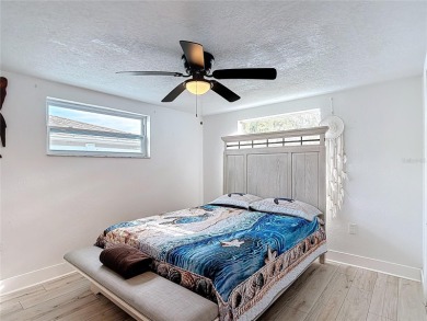 Live the Florida lifestyle in the highly sought-after waterfront on Gulf Harbors Golf Course in Florida - for sale on GolfHomes.com, golf home, golf lot