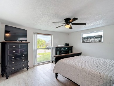 Live the Florida lifestyle in the highly sought-after waterfront on Gulf Harbors Golf Course in Florida - for sale on GolfHomes.com, golf home, golf lot