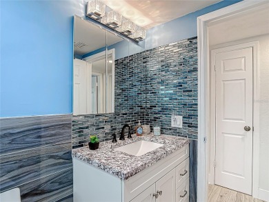 Live the Florida lifestyle in the highly sought-after waterfront on Gulf Harbors Golf Course in Florida - for sale on GolfHomes.com, golf home, golf lot