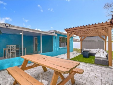 Live the Florida lifestyle in the highly sought-after waterfront on Gulf Harbors Golf Course in Florida - for sale on GolfHomes.com, golf home, golf lot
