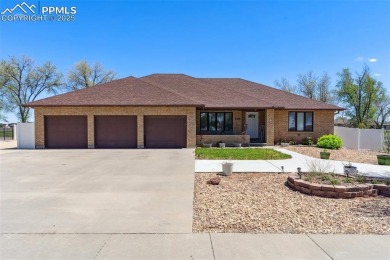 This beautifully updated rancher is a true gem--backing right up on Desert Hawk At Pueblo West in Colorado - for sale on GolfHomes.com, golf home, golf lot