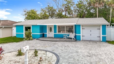 Live the Florida lifestyle in the highly sought-after waterfront on Gulf Harbors Golf Course in Florida - for sale on GolfHomes.com, golf home, golf lot