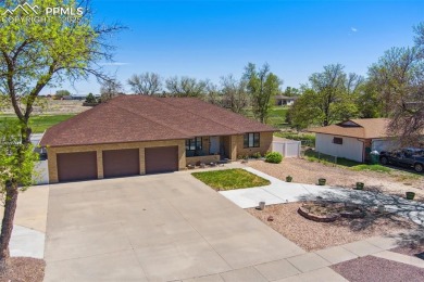 This beautifully updated rancher is a true gem--backing right up on Desert Hawk At Pueblo West in Colorado - for sale on GolfHomes.com, golf home, golf lot