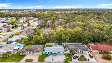 Live the Florida lifestyle in the highly sought-after waterfront on Gulf Harbors Golf Course in Florida - for sale on GolfHomes.com, golf home, golf lot