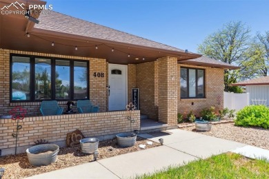 This beautifully updated rancher is a true gem--backing right up on Desert Hawk At Pueblo West in Colorado - for sale on GolfHomes.com, golf home, golf lot
