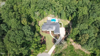 Discover the epitome of luxury living in this custom-built home on Chapel Ridge Golf Club in North Carolina - for sale on GolfHomes.com, golf home, golf lot