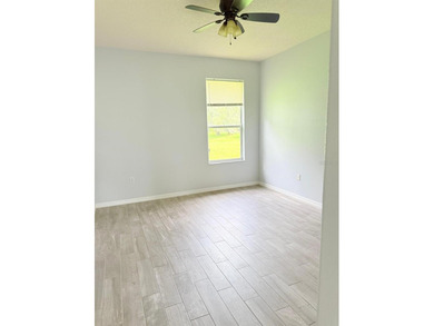 LOCATION AND MORE.   This is a gorgeous and renovated one single on Oaks National Golf Course in Florida - for sale on GolfHomes.com, golf home, golf lot